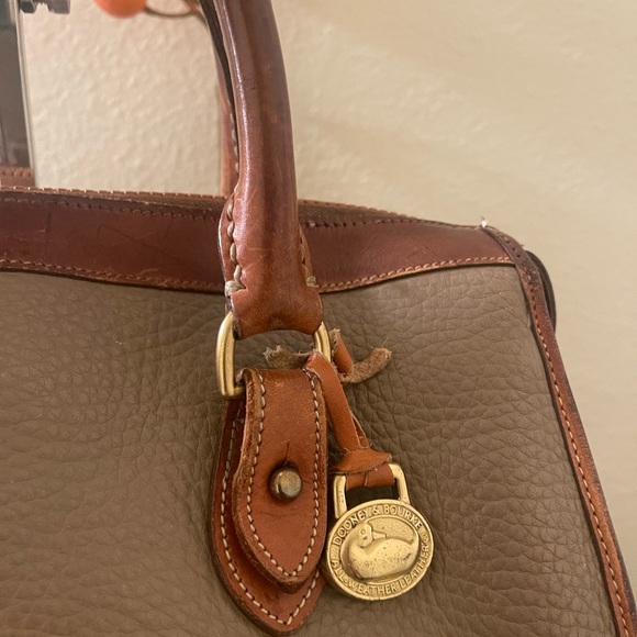 Dooney & Burke Taupe Leather Satchel w/ Cognac Handles & logo charm w/feet - Picture 2 of 6